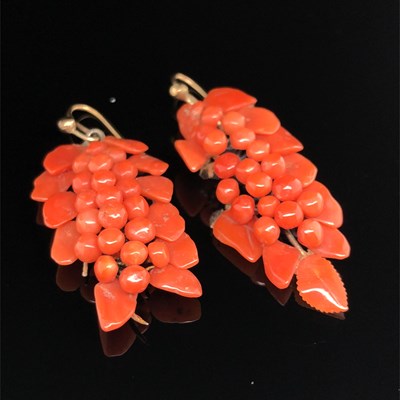 Lot 5 - An antique coral brooch and earring suite in...