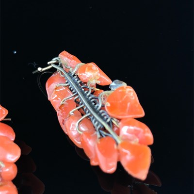 Lot 5 - An antique coral brooch and earring suite in...