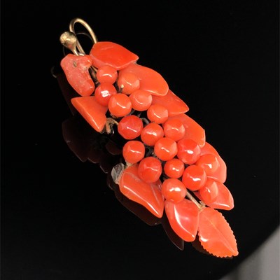 Lot 5 - An antique coral brooch and earring suite in...