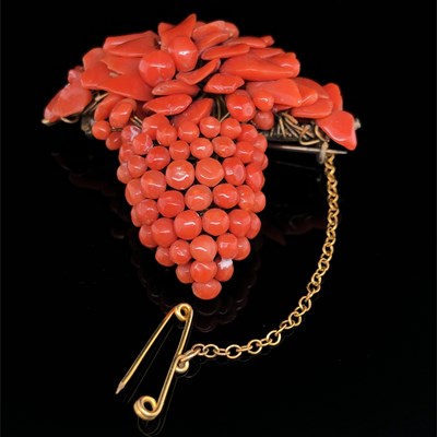 Lot 5 - An antique coral brooch and earring suite in...
