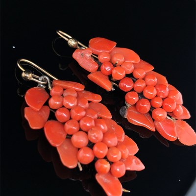 Lot 5 - An antique coral brooch and earring suite in...