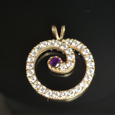 Lot 25 - A gemset and cz contemporary pendant....