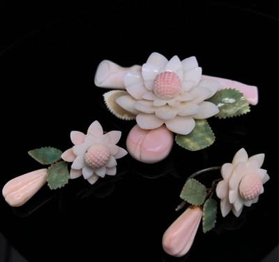 Lot 30 - A vintage coral brooch and earrings suite....