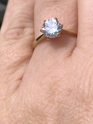 Lot 33 - Diamond solitaire. A 1.13ct estimated round...