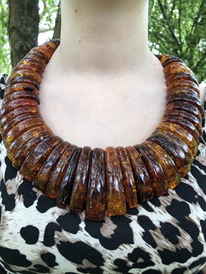 Lot 34 - A large and impressive amber collar necklace,...