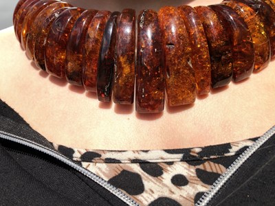 Lot 34 - A large and impressive amber collar necklace,...