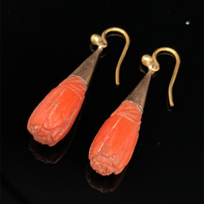 Lot 36 - Two pairs of antique coral earrings. A carved...