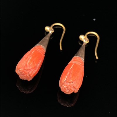 Lot 36 - Two pairs of antique coral earrings. A carved...