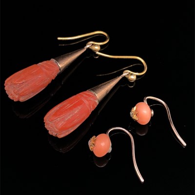 Lot 36 - Two pairs of antique coral earrings. A carved...