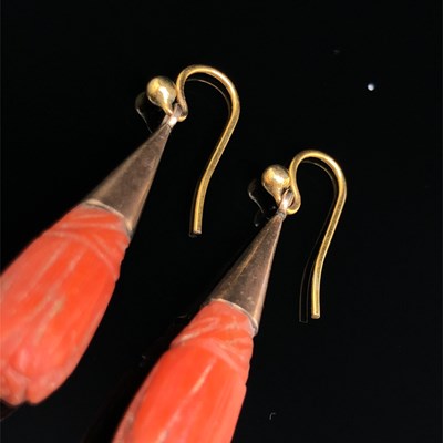 Lot 36 - Two pairs of antique coral earrings. A carved...