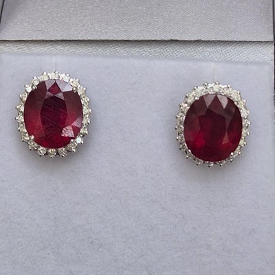 Lot 39 - A pair of large ruby and diamond cluster...