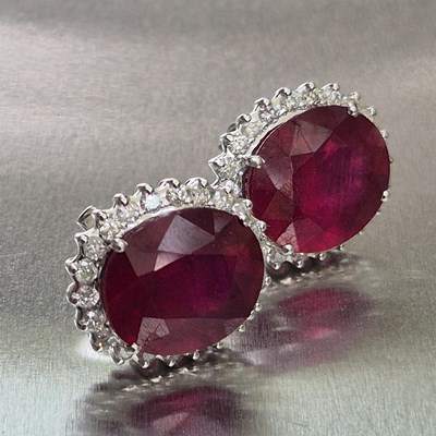 Lot 39 - A pair of large ruby and diamond cluster...
