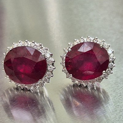Lot 39 - A pair of large ruby and diamond cluster...