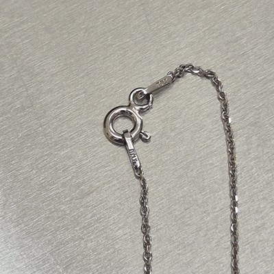 Lot 44 - A blue topaz and diamond articulating drop...