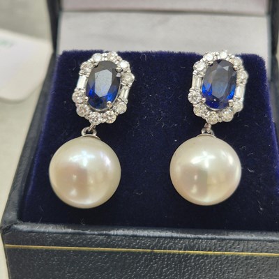 Lot 54 - A pair of sapphire, diamond and pearl cocktail...