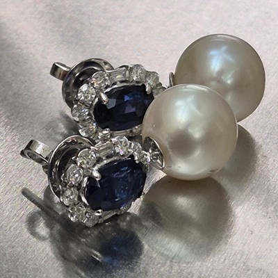 Lot 54 - A pair of sapphire, diamond and pearl cocktail...