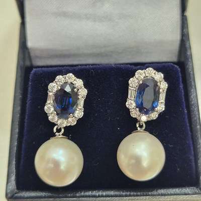 Lot 54 - A pair of sapphire, diamond and pearl cocktail...