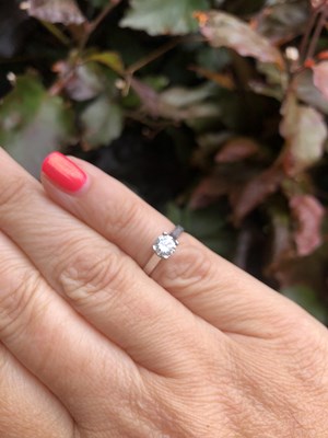 Lot 57 - A diamond and platinum hallmarked solitaire...
