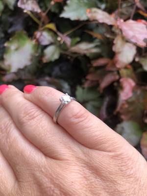 Lot 57 - A diamond and platinum hallmarked solitaire...