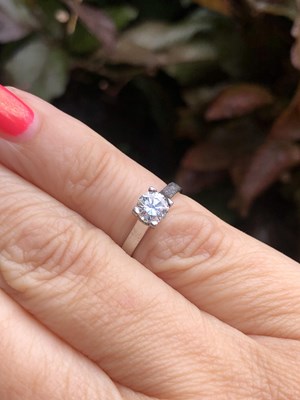 Lot 57 - A diamond and platinum hallmarked solitaire...