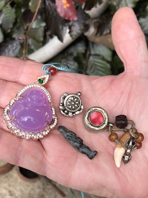 Lot 246 - Two Chinese white metal good luck pendants,...