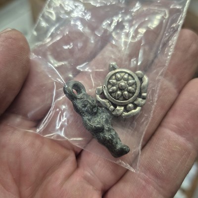 Lot 246 - Two Chinese white metal good luck pendants,...