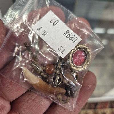 Lot 246 - Two Chinese white metal good luck pendants,...
