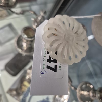 Lot 247 - Three Chinese pierced roundel pendants in jade...