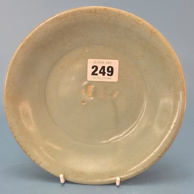 Lot 249 - A Chinese clair de lune celadon dish.   Dia....