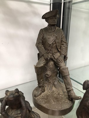 Lot 212 - A group of seven cast bronzed figures.