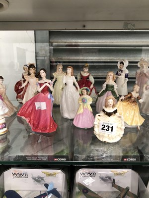 Lot 231 - A collection of figurines by Royal Doulton and...