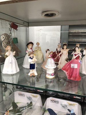 Lot 231 - A collection of figurines by Royal Doulton and...