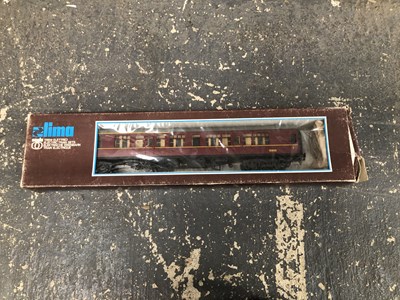 Lot 239 - Seven boxed Lima 0 gauge railway carriages.