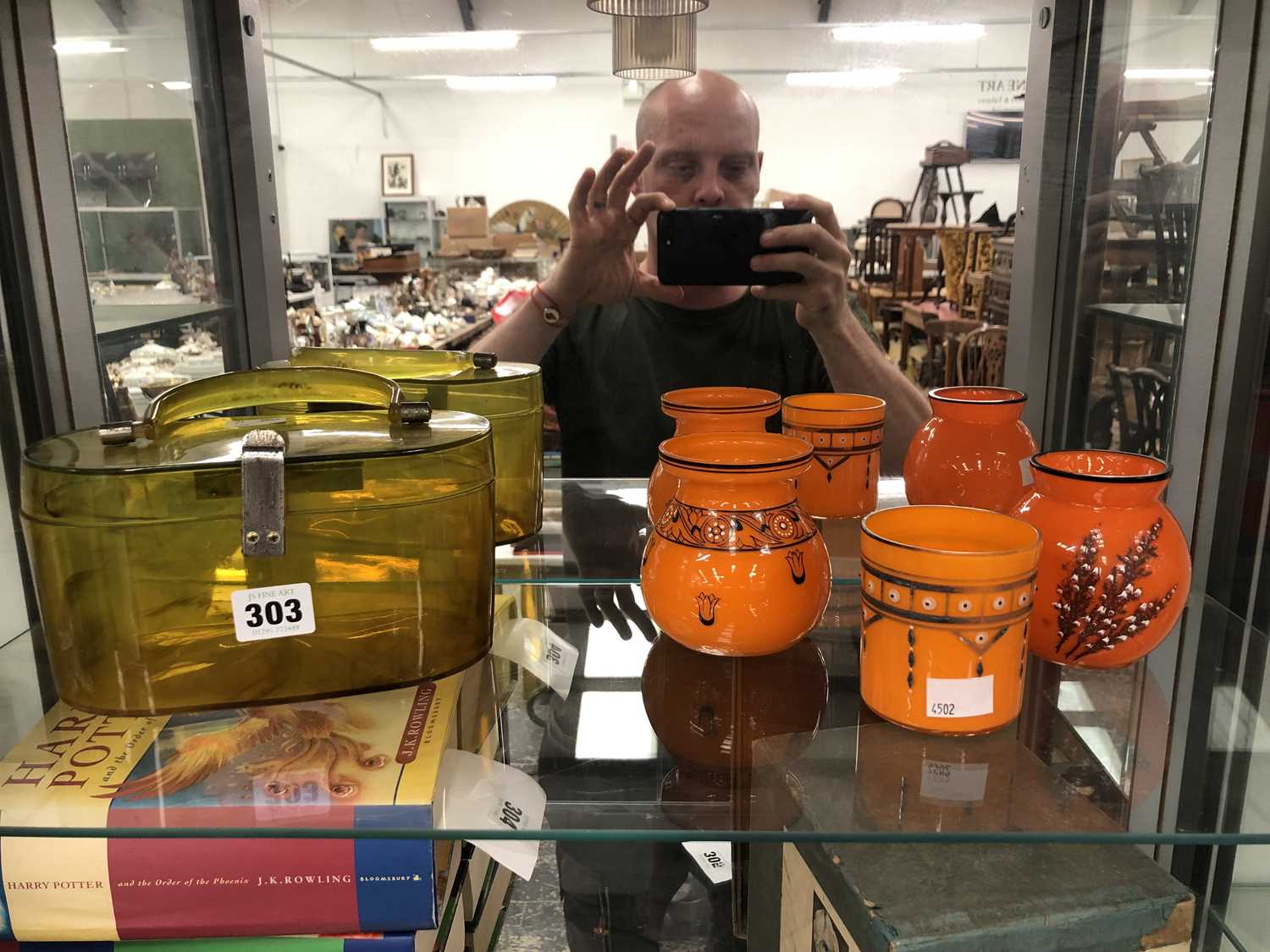 Lot 303 - A vintage Lucite bag and three vintage orange...