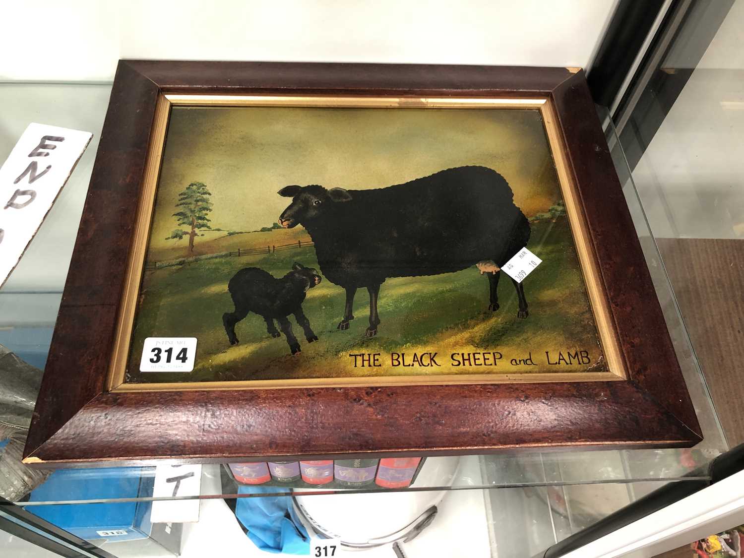 Lot 314 - The Black Sheep and Lamb, reverse print on...