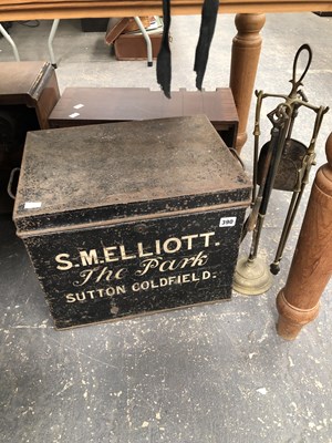 Lot 390 - A tin trunk to S.M Elliott and a fire side...