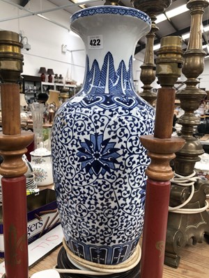 Lot 422 - A vintage blue and white lotus lamp, a...