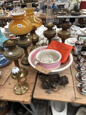 Lot 428 - Six various brass oil lamps some with shades,...