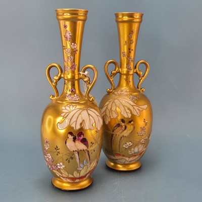 Lot 259 - A pair of Limoges gold ground two handled...