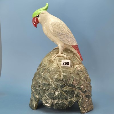 Lot 268 - A Doulton majolica model of a parrot perched...