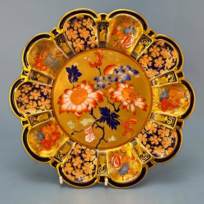 Lot 270 - A Royal Crown Derby Imari palette petal edged...
