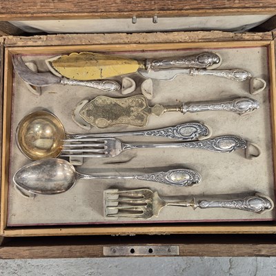 Lot 275 - An oak four drawer canteen of electroplate...