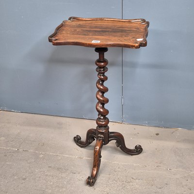 Lot 280 - A rosewood tripod table, the shaped and dished...