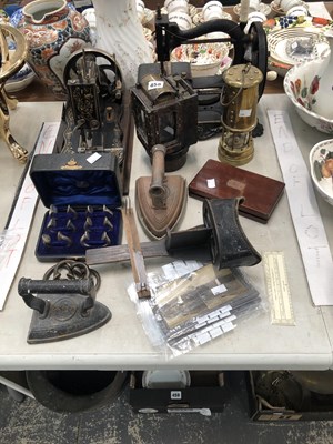 Lot 458 - Two sewing machines, a miner's lamp, another...