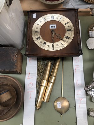 Lot 488 - A brass weight driven wall clock by Hermle