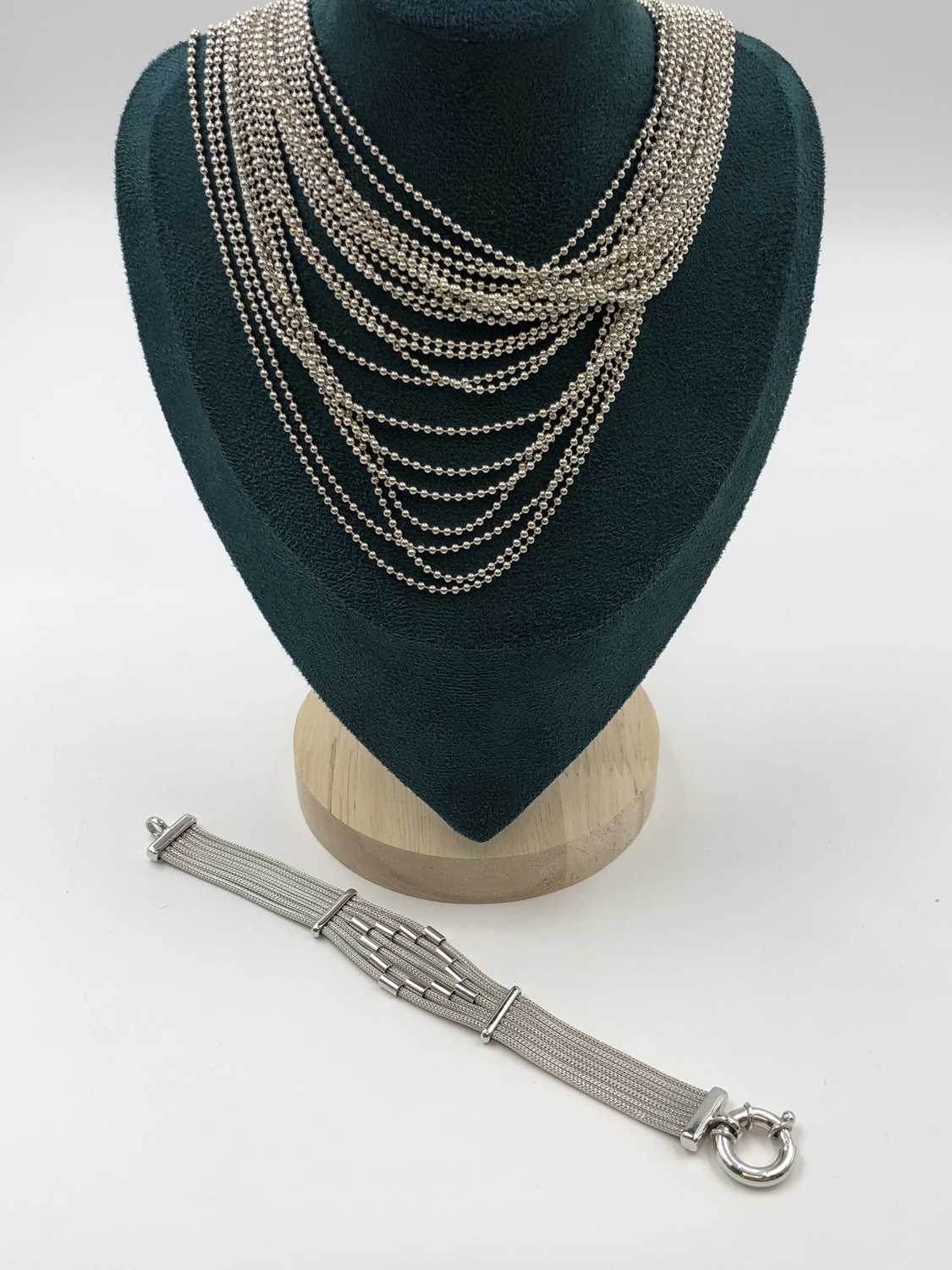 Lot 9 - Italian silver - a multi-strand beaded...