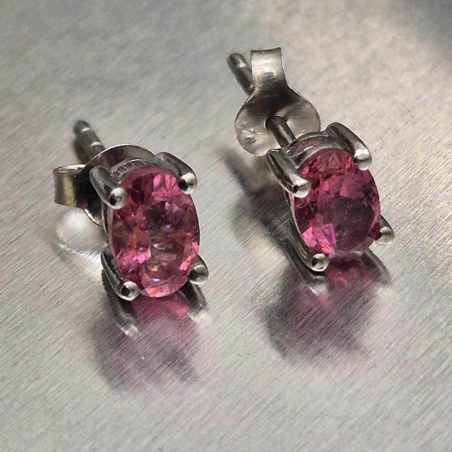 Lot 16 - A pair of oval-cut pink tourmaline stud...