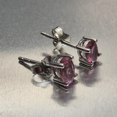 Lot 16 - A pair of oval-cut pink tourmaline stud...