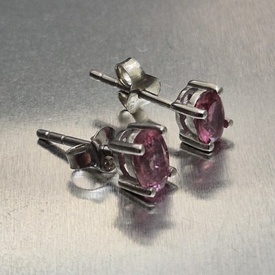 Lot 16 - A pair of oval-cut pink tourmaline stud...