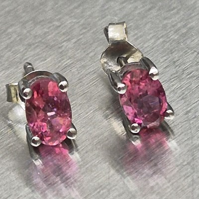 Lot 16 - A pair of oval-cut pink tourmaline stud...
